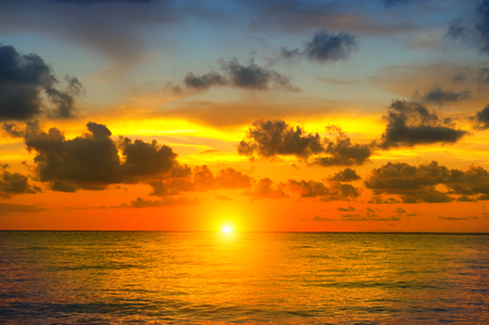Sunset beach with beautiful sky landscape. Travel, vacation concept backgroundの写真素材