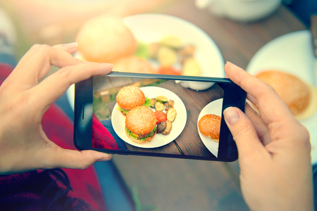 Food photography of hamburgers with vegetables. Top view smartphone photo for social networksの写真素材