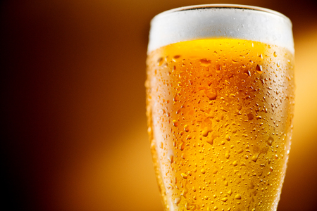 Beer. Glass of cold craft beer with water dropsの写真素材