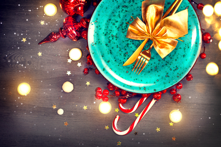 Christmas dinner table setting. Abstract holiday wooden backgroundの写真素材