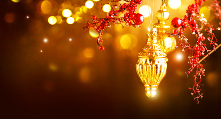 Christmas and New Year golden decoration. Abstract blinking holiday backgroundの写真素材