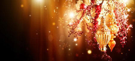 Christmas and New Year golden decoration. Abstract blinking holiday backgroundの写真素材