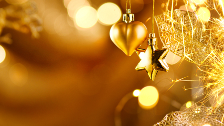 Christmas and New Year golden decorations. Abstract blinking holiday backgroundの写真素材