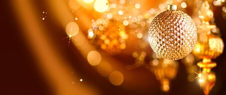 Christmas and New Year golden decorations. Abstract blinking holiday backgroundの写真素材