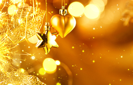 Christmas and New Year golden decorations. Abstract blinking holiday backgroundの写真素材
