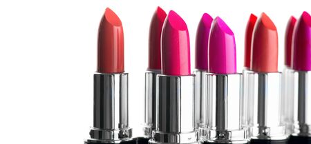 Lipstick. Fashion Colorful Lipsticks isolated on white background. Lipstick tints palette, Professional Makeup and Beauty. Beautiful Make-up concept. Lipgloss. Lipsticks closeupの写真素材