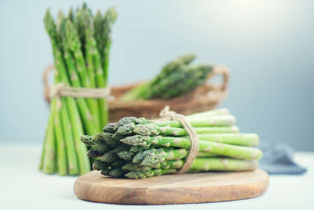 Asparagus. Fresh raw organic green Asparagus sprouts closeup. Healthy vegetarian food. Raw vegetables, market. Healthy vegetarian food cooking. Healthy eating concept, dietの写真素材