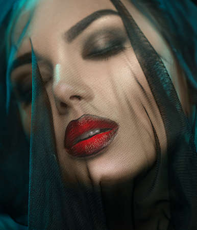 Beauty Sexy Vampire Girl with bloody red lips.の写真素材