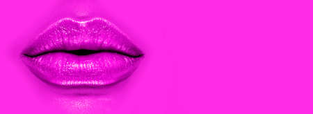 Beautiful young woman's lips closeup, on purple background. Plastic surgery, fillers, injection. Part of the model girl face, youth concept. Perfect mouth, make-up. Health care. Art designの写真素材
