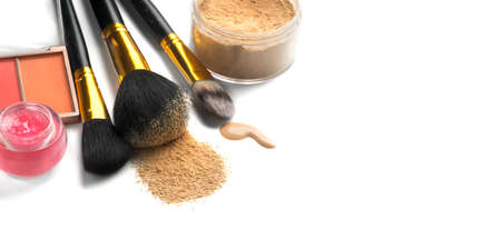 Make-up cosmetics. Face contouring make up, contour. Highlight, shade. Makeup Products, make up artist tools. Foundation, concealer. Brushes, blush, lip gloss, powder isolated on white backgroundの写真素材