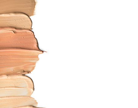 Set of cosmetic liquid foundation or cream in different colour smudge smear strokes.の写真素材
