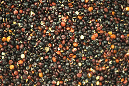Quinoa Black grains background, flat lay backdrop. Gluten free Healthy food. Diet, dieting concept. Seeds of black quinoa - Chenopodium quinoa. Flatlay, top viewの写真素材