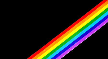 Colorful rainbow ribbon border design. LGBT colourful corner design, isolated on black background. Gay pride design. Ribbon or banner with flag of LGBTQ pride borderの写真素材