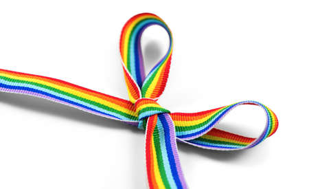 Colorful rainbow ribbon bow. LGBT colourful corner design, isolated on white background. Gay pride design. Ribbon or banner with flag of LGBTQ pride border. Giftの写真素材