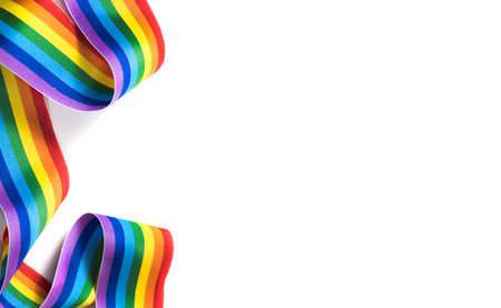 Colorful rainbow ribbon border design. LGBT colourful corner design, isolated on white background. Gay pride design. Curly, waving ribbon or banner with flag of LGBTQ pride border.の写真素材