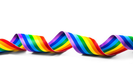 Colorful LGBTQ rainbow ribbon close up, isolated on white background. LGBT colourful design. Gay pride design. Curly, waving ribbon or banner with flag of LGBTQ pride artの写真素材