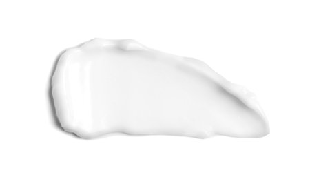White cream smear, isolated on white background. Moisturizer, facial, hands or body cream, beauty product texture, smudge.の写真素材