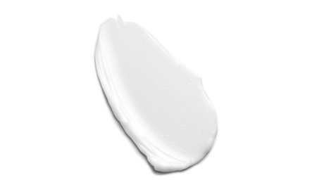 White cream smear, isolated on white background. Moisturizer, facial, hands or body cream, beauty product texture, smudge.の写真素材