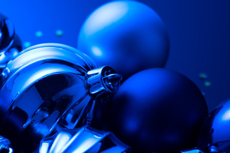 Christmas and New Year blue color baubles decoration background.  Art design backdrop with holiday balls. Beautiful Christmas ball closeupの写真素材