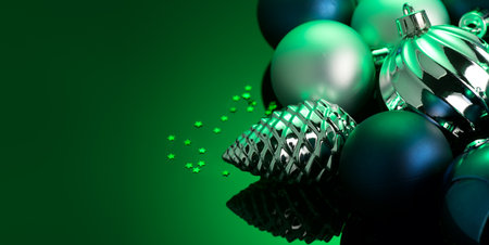 Christmas and New Year green color baubles decoration background.  Art design backdrop with holiday ball. Beautiful Christmas balls closeup. Copy spaceの写真素材