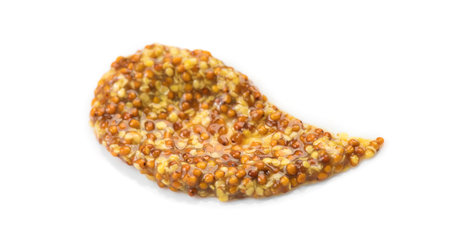 Mustard, French Dijon mustard sauce smear with whole seeds, isolated on white background. Grainy texture. French pickled mustard seeds sauce. Top viewの写真素材