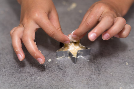 Homemade baking, kitchen scene showing Butter, Flour, Sugar and Vanilla Seeds being mixed to make...