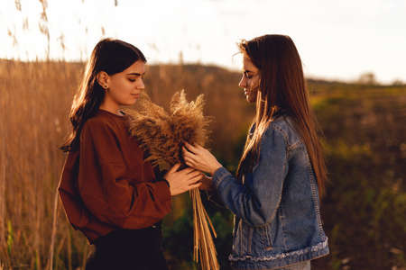 Nice positive portrait of the best friends. Young girls. Natural lights.の写真素材