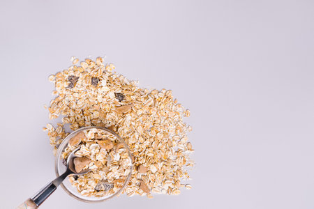 Proper nutrition for those who support a healthy lifestyle. Cereals and food items on ultimate gray, empty side space.の写真素材