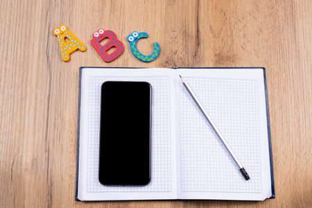 Online education. Foreign language e-learning course on empty mock up smartphone screen. Empty...