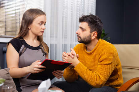 Psychotherapeutic counseling of a caucasian man, addicted to gambling. Psychological help for a violent husband. Social reintegration. High quality photoの写真素材