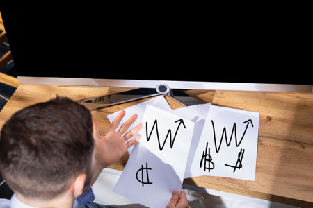 Top view of desktop with the financial report. Business documents, blank sheet, exposure of...