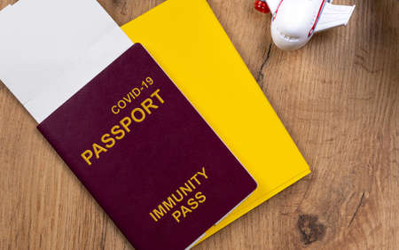 Covid-19 Immunity passport. Coronavirus and travel concept. Document for a person who is immune to the coronavirus. High quality photoの写真素材