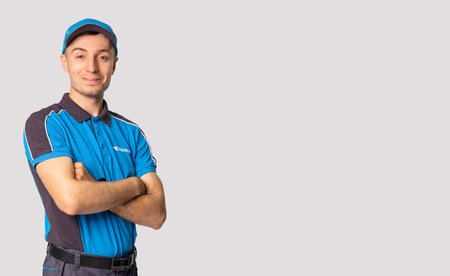 Hincesti, Moldova - 19.04.21: Man is wearing Hermes Europe GmbH working uniformのeditorial素材