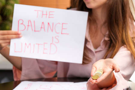 The banner with an inscription of balance is limited for paying because of coronavirus crisis and no work for people.の写真素材