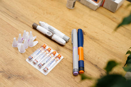 Top view photo of items human needs to control blood glucose level by himself being at home, diabetes concept.の写真素材