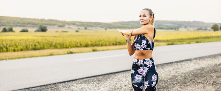 Slim girl play yoga on the lawn at the park,relax in nature, Girls love health practicing yoga.の写真素材
