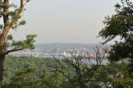 View of Mumbai port in far distance from the topの写真素材
