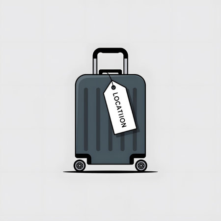 A dark gray suitcase with a white location tag is depicted in a simple minimalist style against a light gray background. The illustration features clean lines and flat colors.のイラスト素材