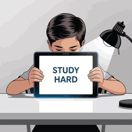 A boy holds a tablet displaying "STUDY HARD" under a desk lamp. Scalable vector format suitable f...のイラスト素材
