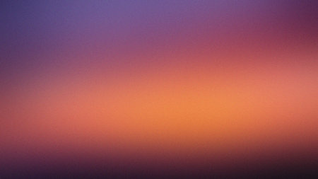A sunset gradient displays soft transitions of purple, orange, and yellow tones. Clear details an...の写真素材
