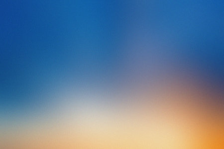 A blue sky gradient smoothly blends into a warm yellow horizon. Clear details and vibrant colors ...の写真素材