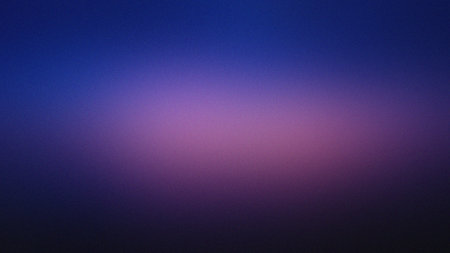 Blurry gradient background with vibrant purple and blue tones transitioning from dark to light.の写真素材