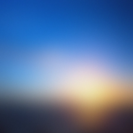 Blurred sky gradient from deep blue to yellow with a dark horizon. Clear details and vibrant colo...の写真素材