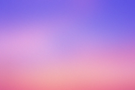 Gentle gradient background with soft lavender, pink, and light orange tones, subtle grain.の写真素材