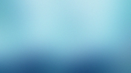 A softly blurred gradient background transitioning from light blue to deep teal with a subtle...の写真素材