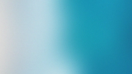 A soft blue and white gradient background with a subtle grainy texture. Clear details and vibrant...の写真素材