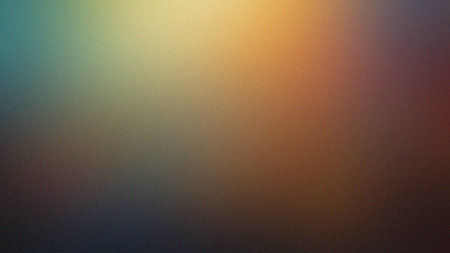 A warm gradient background with subtle grain texture, blending earthy tones of orange and brown.の写真素材