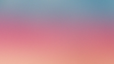 A soft pink and blue gradient background with a fine grain texture. Clear details and vibrant col...の写真素材
