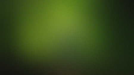 A deep green gradient with a subtle grain texture and soft light effects. Clear details and vibra...の写真素材