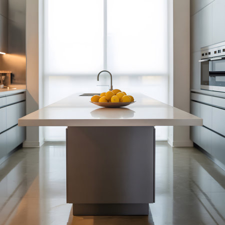 Photo showing modern kitchen island with lemons and sink. High resolution image suitable for...の写真素材